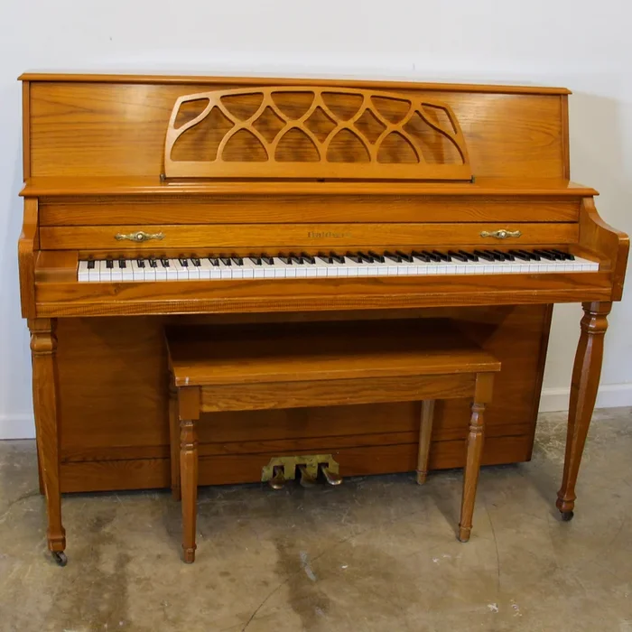 Baldwin 665 Oak Console Piano with bench
